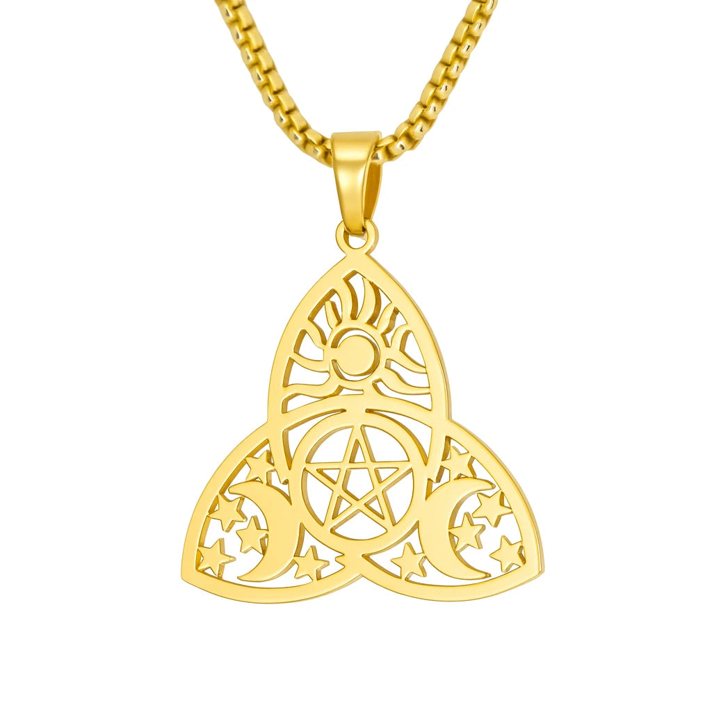 Gold pendant with intricate design on a white background