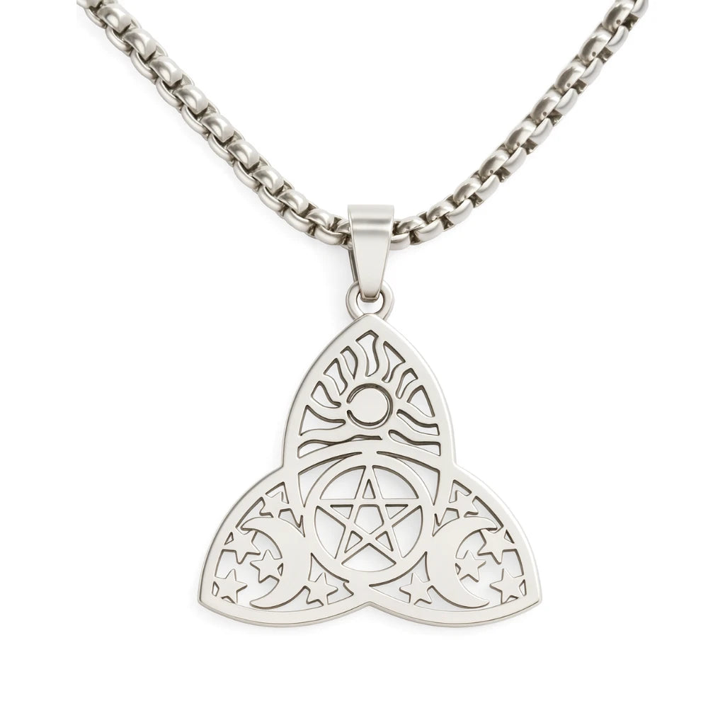 Silver pendant with intricate design on a white background