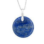 Blue stone pendant on a silver chain against a white background