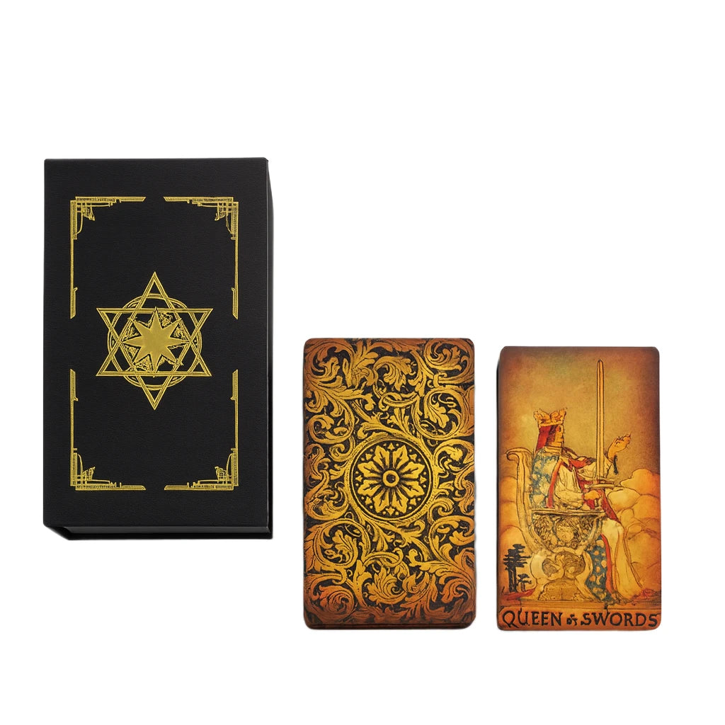 Two tarot card boxes and a black box with decorative designs on a white background